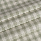 Tonic Living Emmett Plaid Sage home decor fabric ideal for roman shades and curtains in a green check.