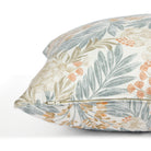 Side zipper detail of Tonic Living Fable 20x20 throw pillow featuring a blue, terracotta, and light brown botanical pattern.