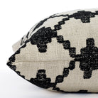 a black and burlap diamond trellis global patterned pillow : close up side view