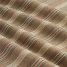 Tonic Living Fisher Stripe Cinnamon high-performance fabric with a hearty woven texture and earthy multicolour stripe.