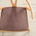 Tonic Living Florence Velvet Mauve upholstery fabric shown on a dining chair in muted purple velvet