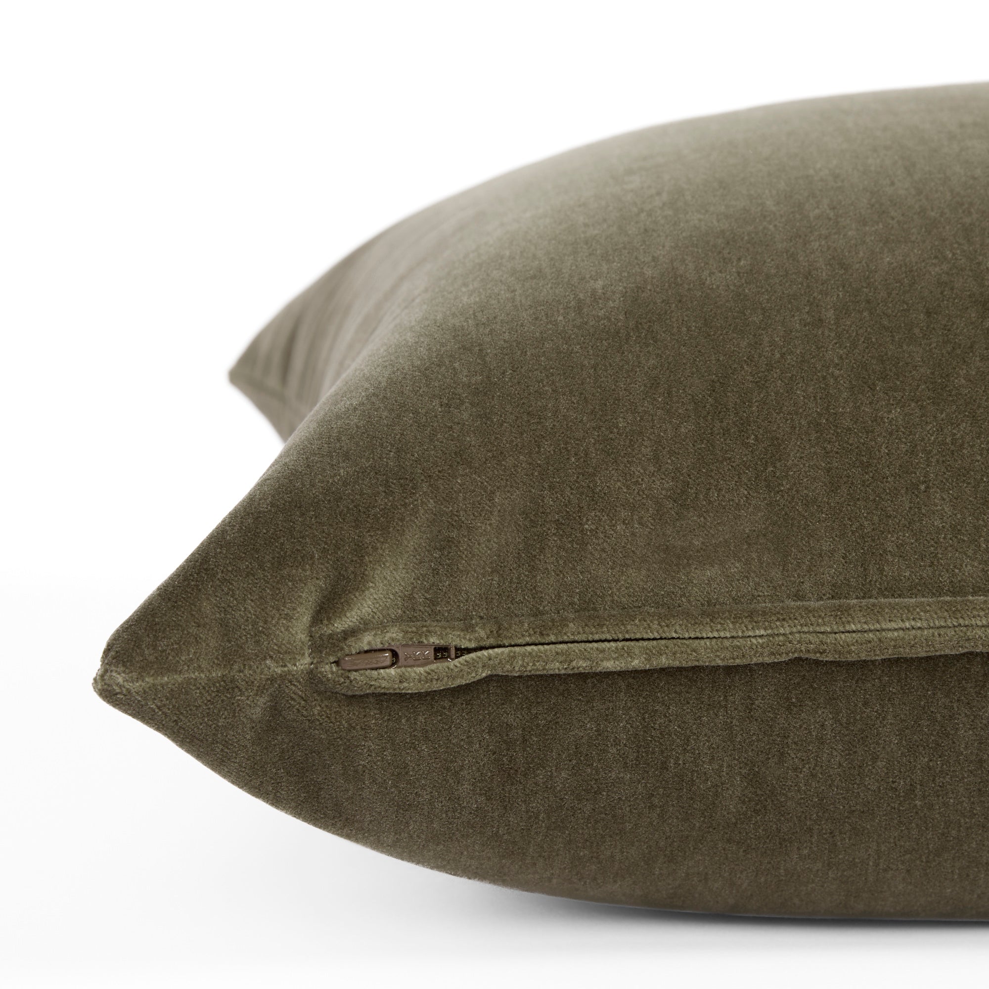 Side zipper detail of Tonic Living Florence Velvet 22x22 pillow in deep Olive green.