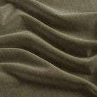 Tonic Living Florence Velvet fabric in Olive featuring a deep, solid green velvet finish.