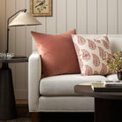 Tonic Living Florence Velvet Rosewood throw pillow styled on a sofa with the Grace 20x20 pillow in Rosewood.