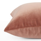 Side view of Tonic Living Florence Velvet decorative pillow in a muted antique pink velvet.