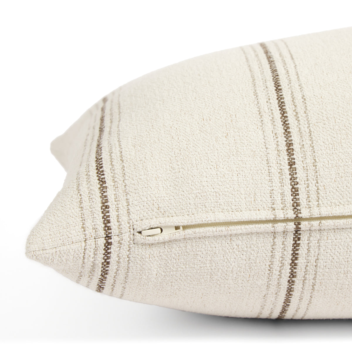 Side zipper detail of Tonic Living Gibson Stripe 16x42 extra large lumbar pillow in beige and brown stripes.