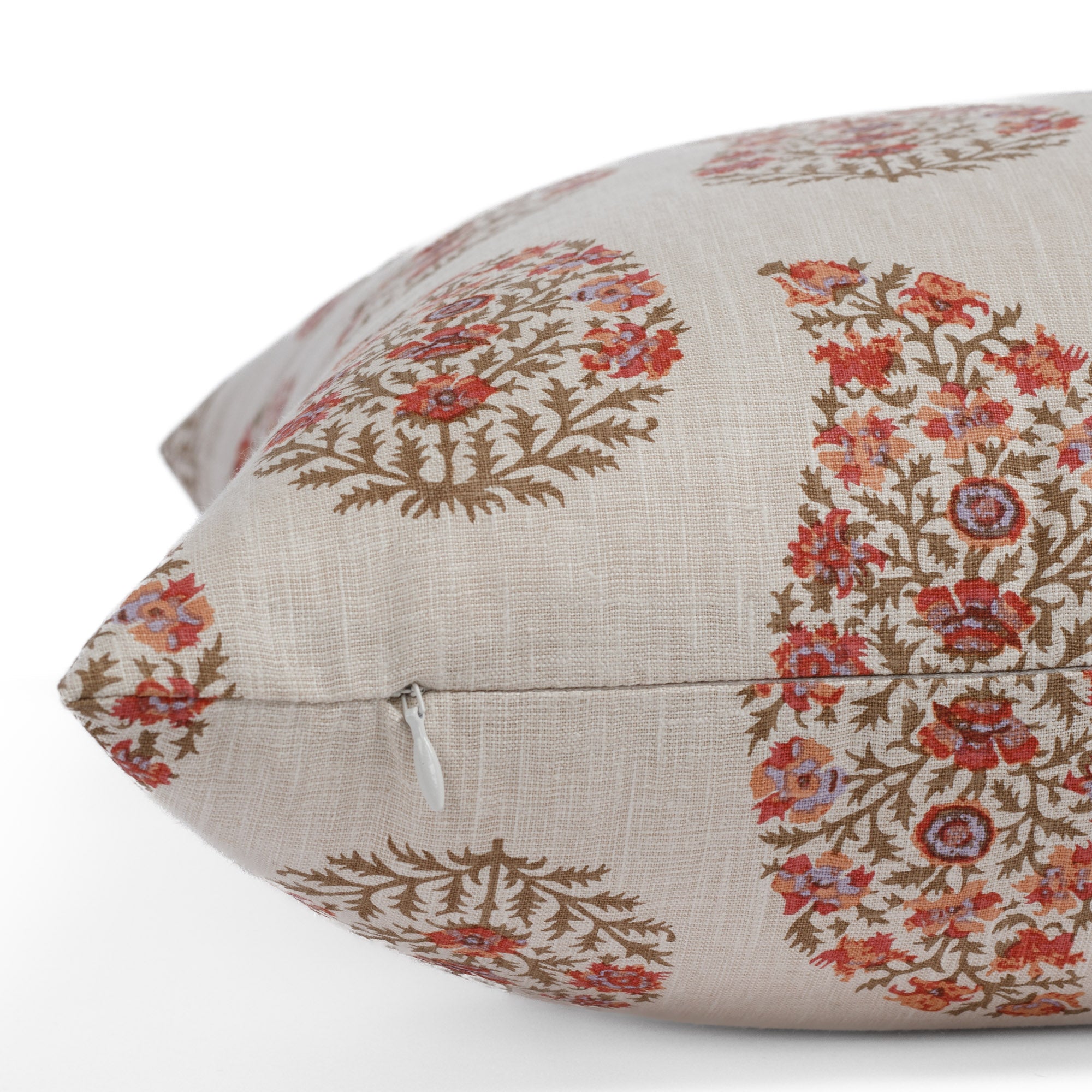 Close up zipper view of Tonic Living Grace 20x20 Accent Pillow, Rosewood in paisley botanical rosewood fabric.