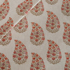 Tonic Living Grace Rosewood paisley drapery fabric in berry red, peach, and lavender.