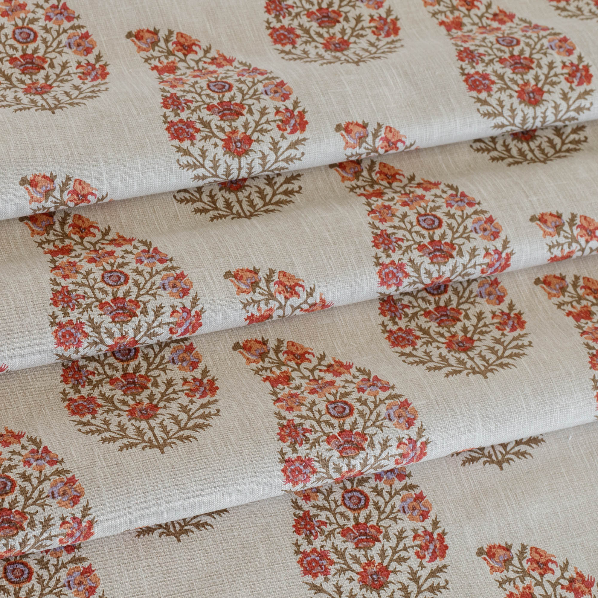 Tonic Living Grace Rosewood block-print paisley fabric styled as roman shade fabric.