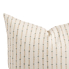 Close up of Tonic Living Hadley Stripe Mist pillow showing a blue and warm brown bamboo-inspired stripe on off-white.