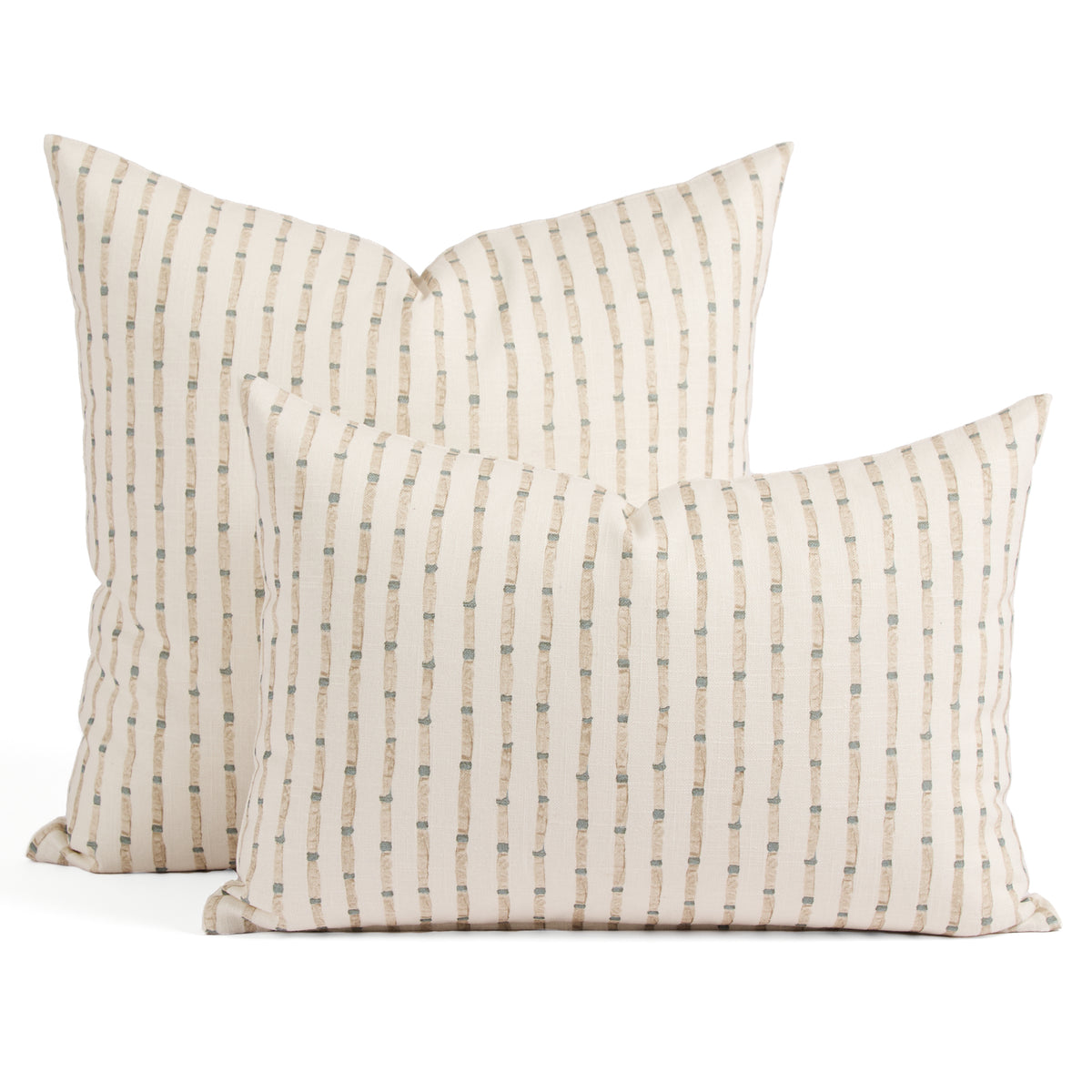 Tonic Living Hadley Stripe pillows in Mist, featuring a 14x20 lumbar pillow and 20x20 throw pillow in blue, warm brown, and off-white stripes.