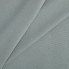 Tonic Living Hampton Chambray upholstery fabric featuring a light blue tone with Belgian linen look and feel.
