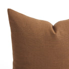 Close up of Tonic Living Hampton Cinnamon pillow showing its warm russet brown colour and linen-inspired woven texture.