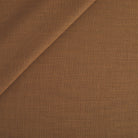 Tonic Living Hampton Fabric in Cinnamon, a cinnamon brown high-performance upholstery fabric with the look of Belgian linen.