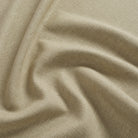 Tonic Living Hampton Flax upholstery fabric featuring a warm neutral tone with Belgian linen look and feel.