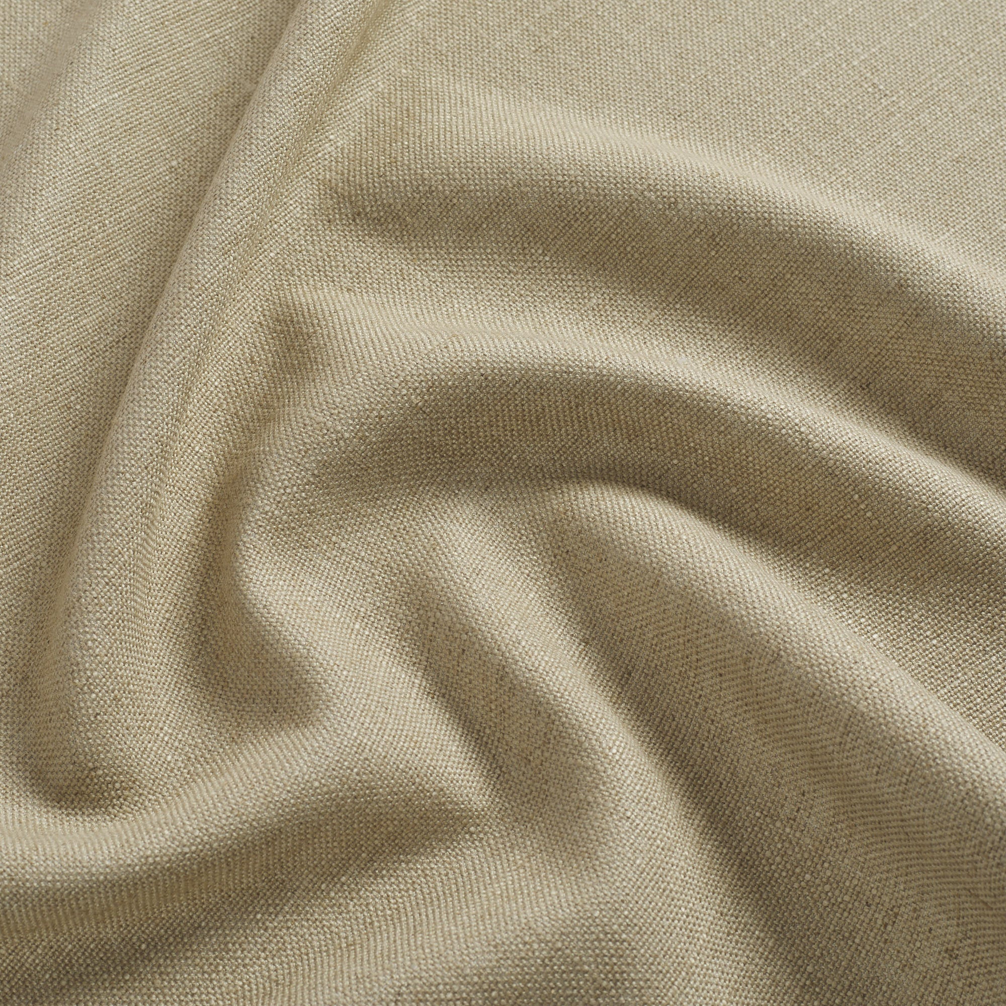 Tonic Living Hampton Flax upholstery fabric featuring a warm neutral tone with Belgian linen look and feel.