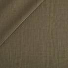 Tonic Living Hampton Fabric in Moss, an earthy green high-performance upholstery fabric with the look of Belgian linen.