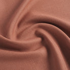 Tonic Living Hampton Rosewood performance upholstery fabric featuring a linen-inspired texture and earthy rose colour.