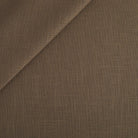 Tonic Living Hampton Fabric in Walnut, a dark brown high-performance upholstery fabric with the look of Belgian linen.