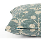 Side zipper detail of Tonic Living Hazel 14x20 lumbar pillow featuring a muted teal blue and oatmeal botanical pattern.