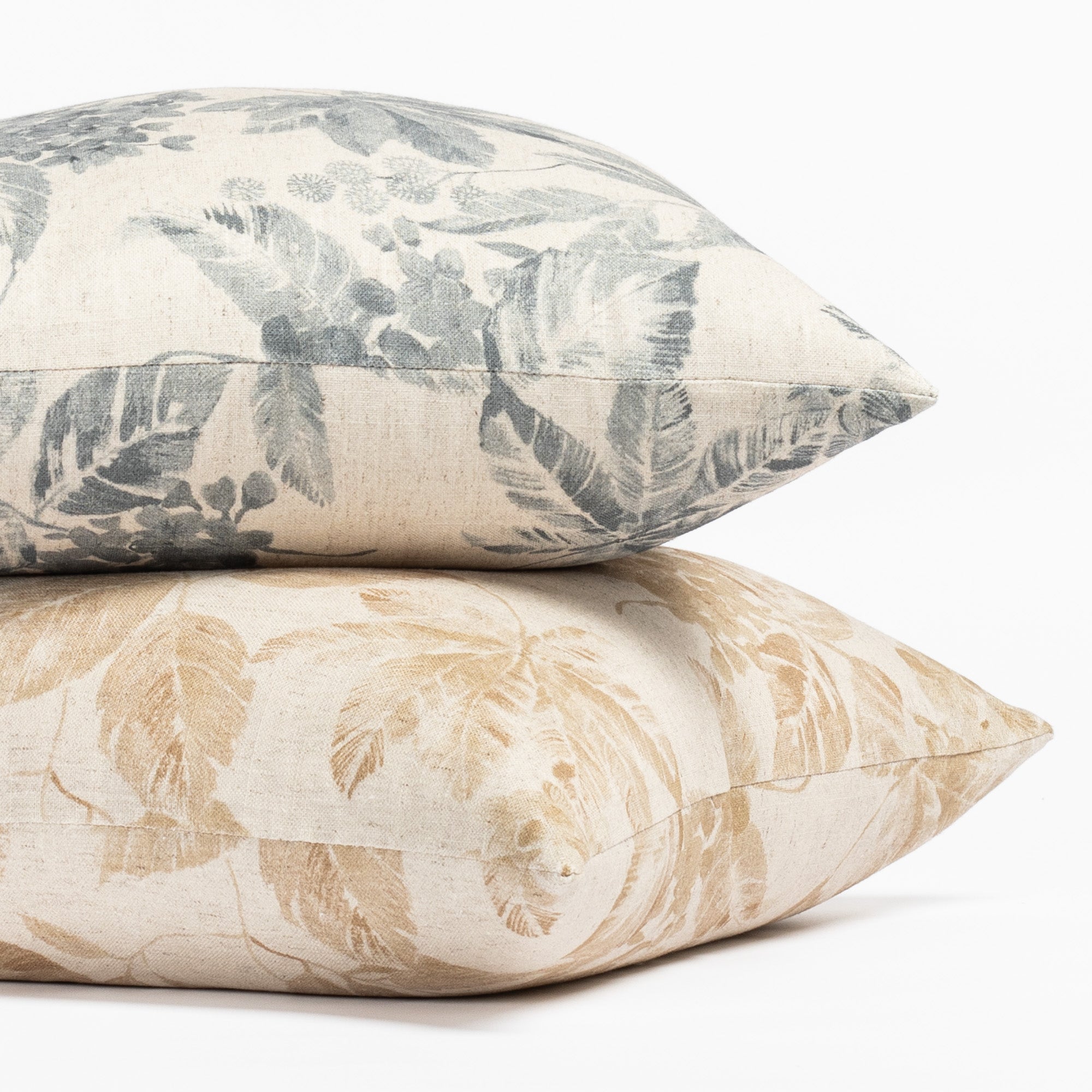 Heather throw pillows: a vintage floral print pillow in indigo blue and ochre brown colourways