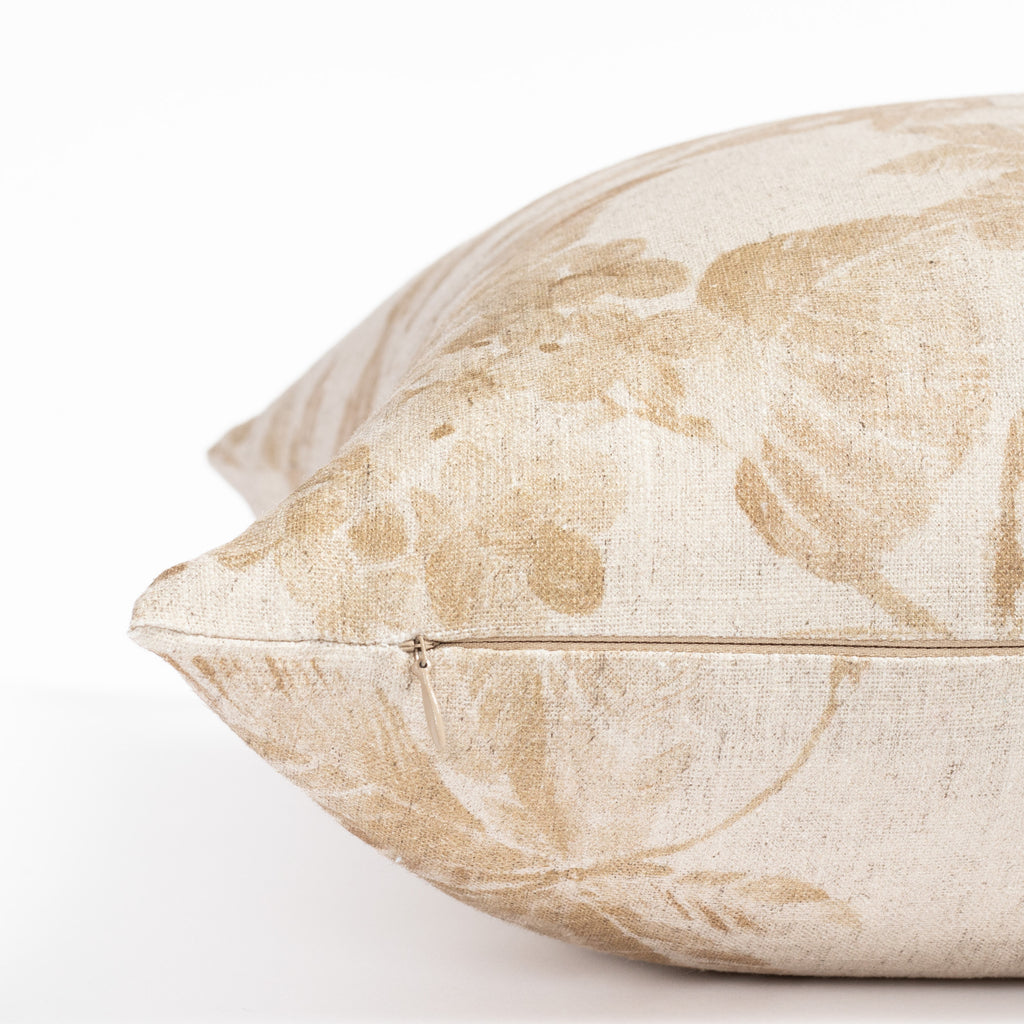 an ochre brown and oatmeal vintage floral print pillow : close up zipper view