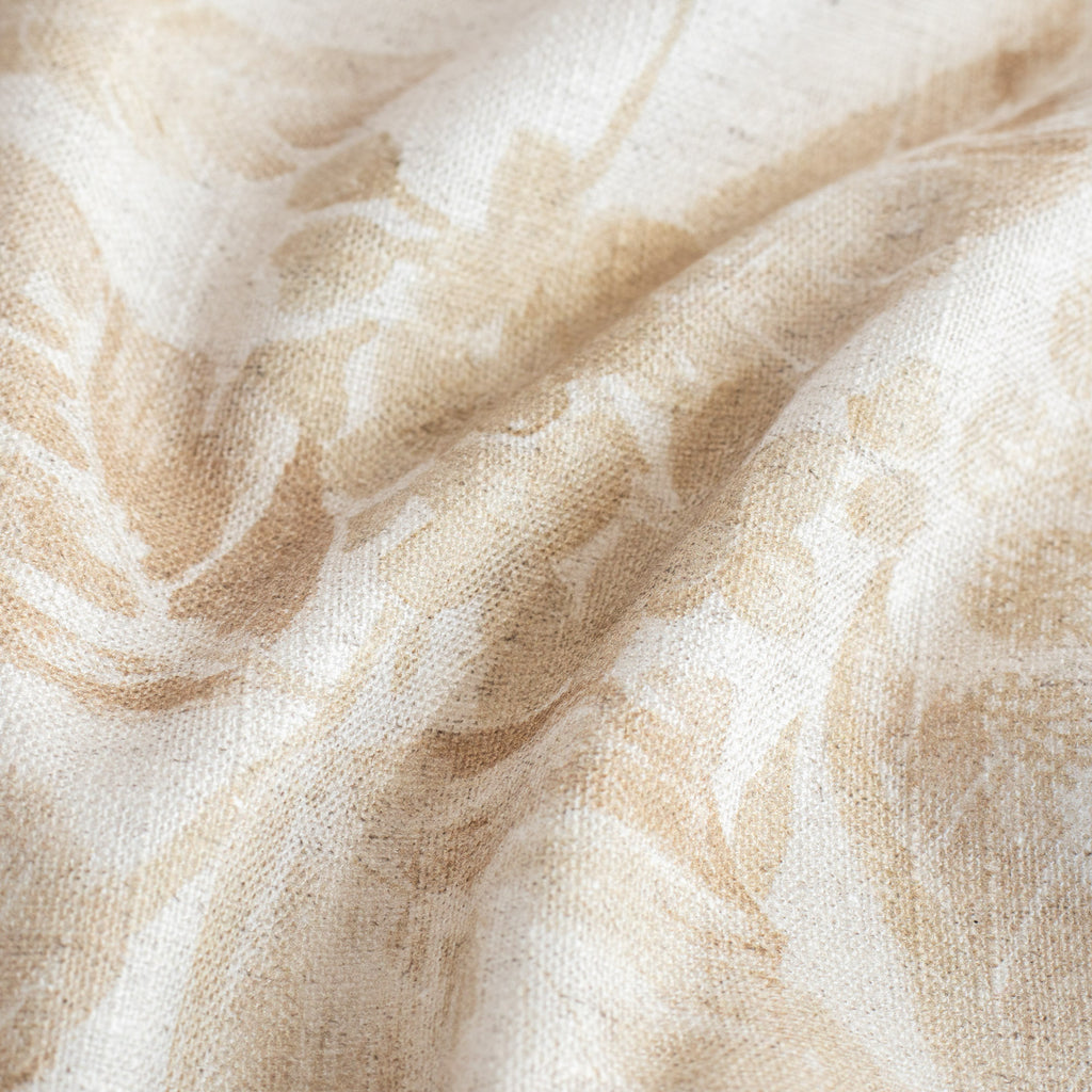 a tonal oatmeal cream and soft ochre brown floral print fabric : close up view