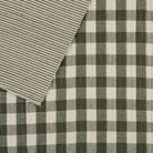 Tonic Living Henry Check Fabric in Forest Green, a quilted matelassé fabric with green gingham check and coordinating stripe reverse.