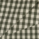 Tonic Living Henry Check Forest Green double-sided quilted fabric with classic gingham design in green and natural tones.