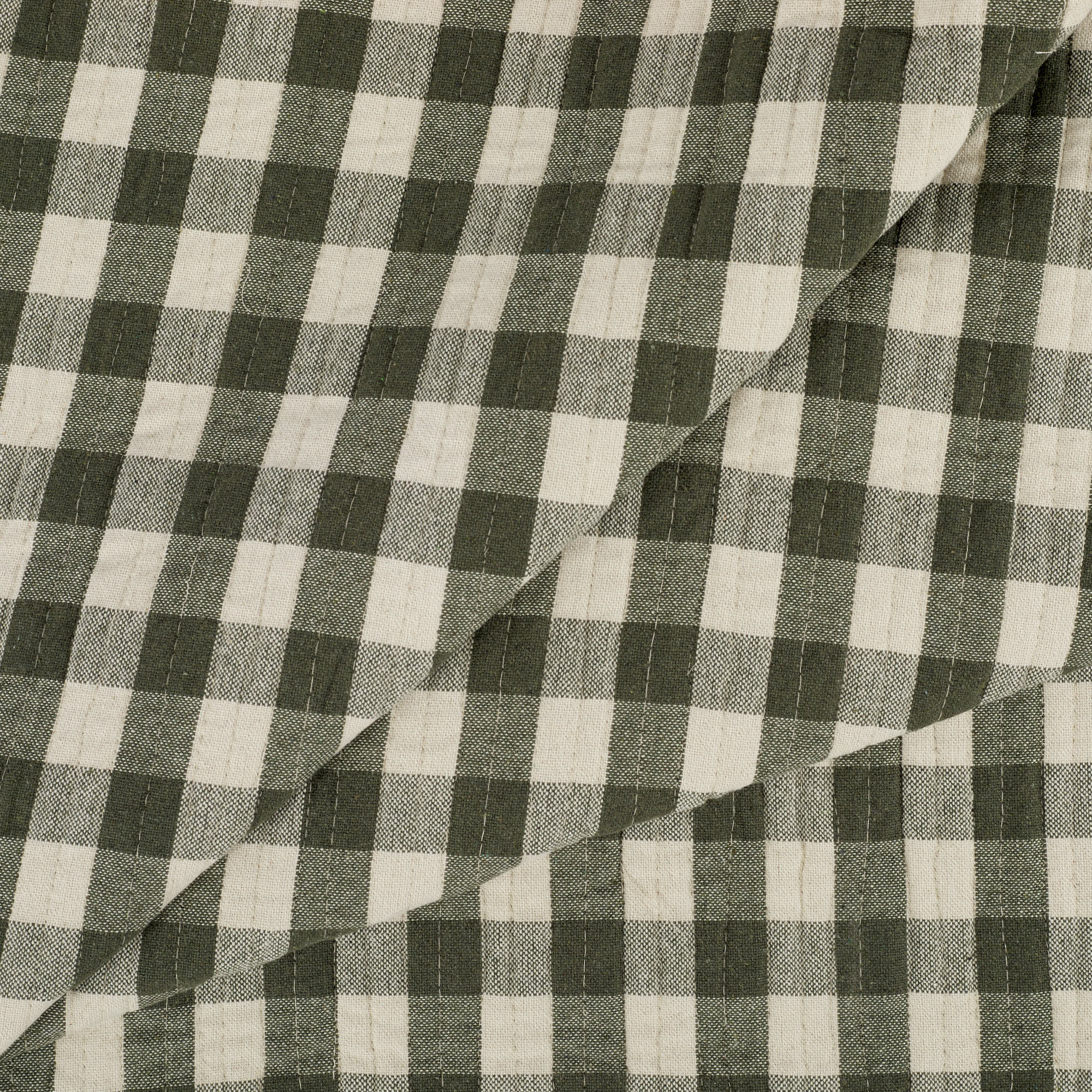 Tonic Living Henry Check Forest Green double-sided quilted fabric with classic gingham design in green and natural tones.
