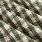 Tonic Living Henry Check Forest Green quilted fabric featuring a dark green and natural gingham check.