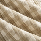 Tonic Living Henry Check Wheat double-sided quilted fabric with classic gingham design in off-white and beige tones.