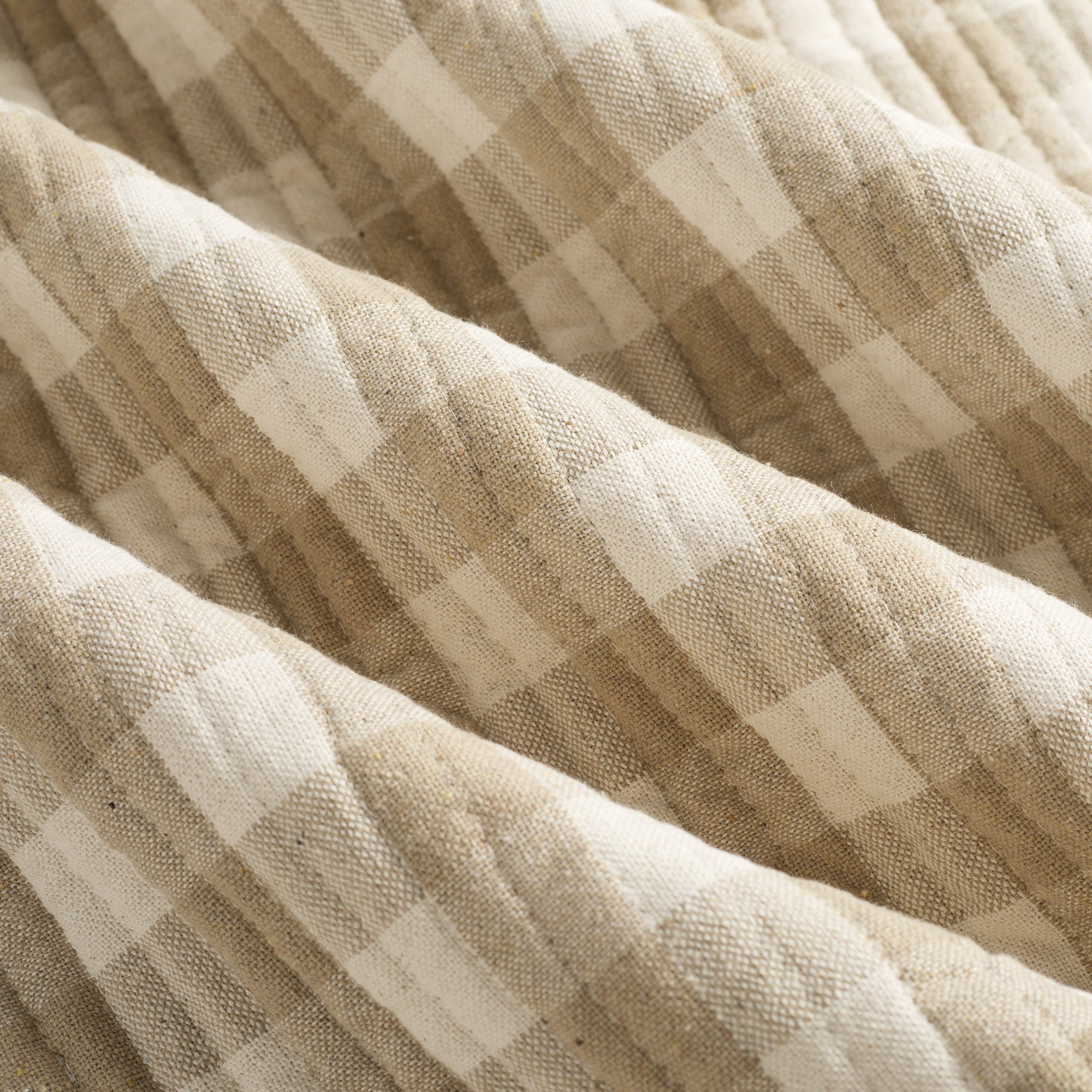 Tonic Living Henry Check Wheat double-sided quilted fabric with classic gingham design in off-white and beige tones.