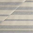 Tonic Living Hopper Stripe Fabric in Denim, a high-performance upholstery fabric with denim blue stripes on a light tan background.