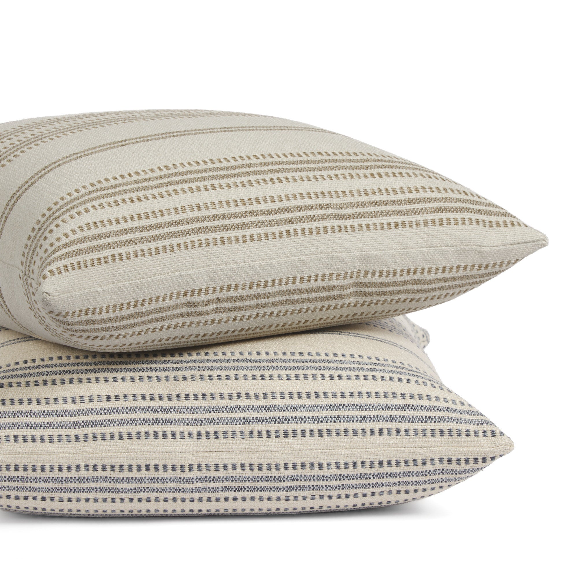 Tonic Living Hopper Stripe throw pillows in Toffee and Denim stacked together, featuring layered stripe designs in brown and blue tones.