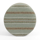 Top view of Tonic Living Indie Stripe round ottoman highlighting its green and teal layered stripe pattern.