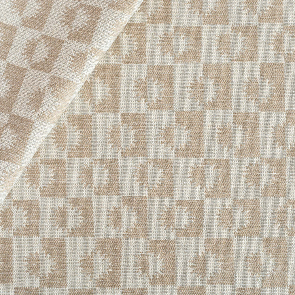 a cream and beige brown checkboard, sun motif patterned upholstery Tonic Living fabric