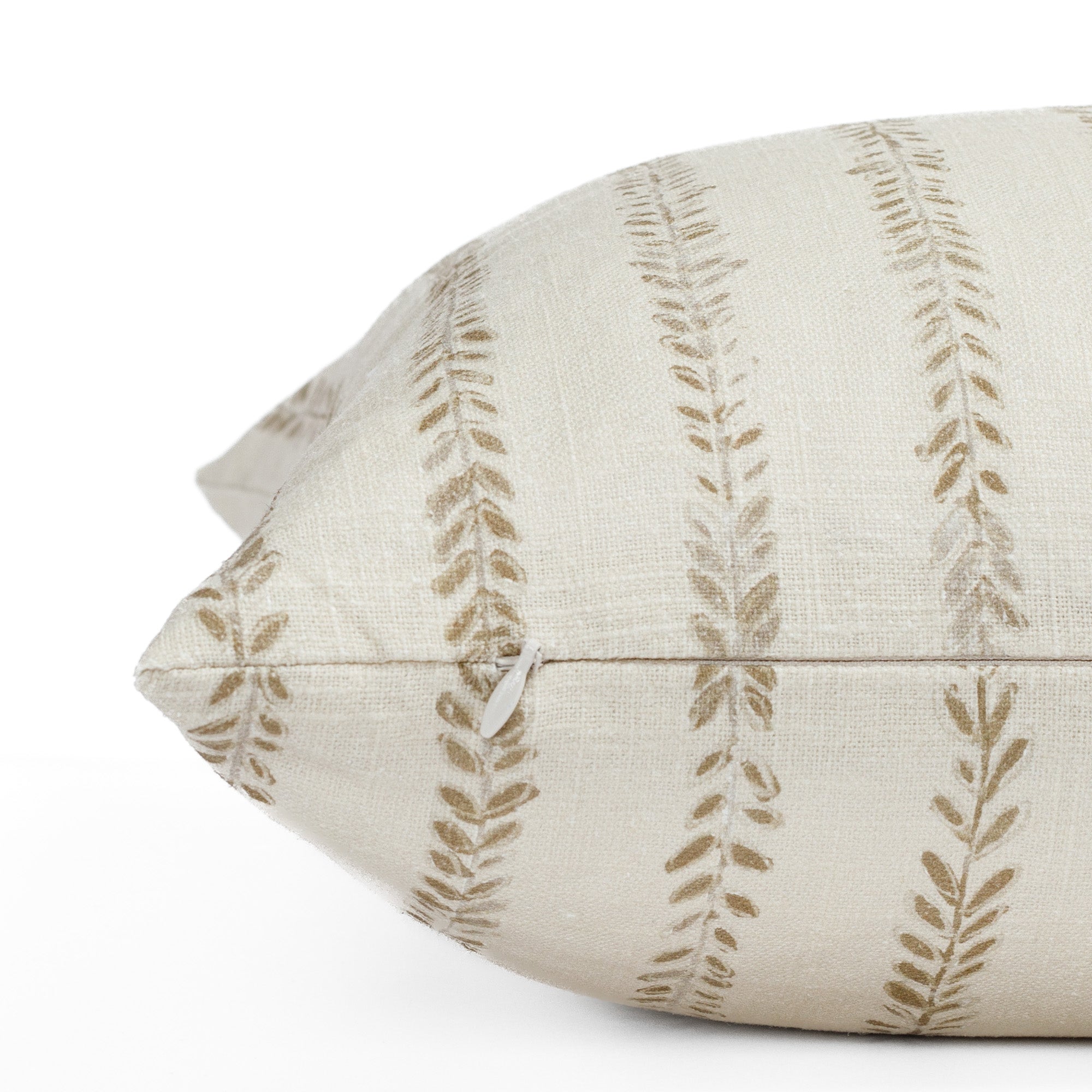a chestnut brown and cream leaf vine  block print pillow : close up zipper view