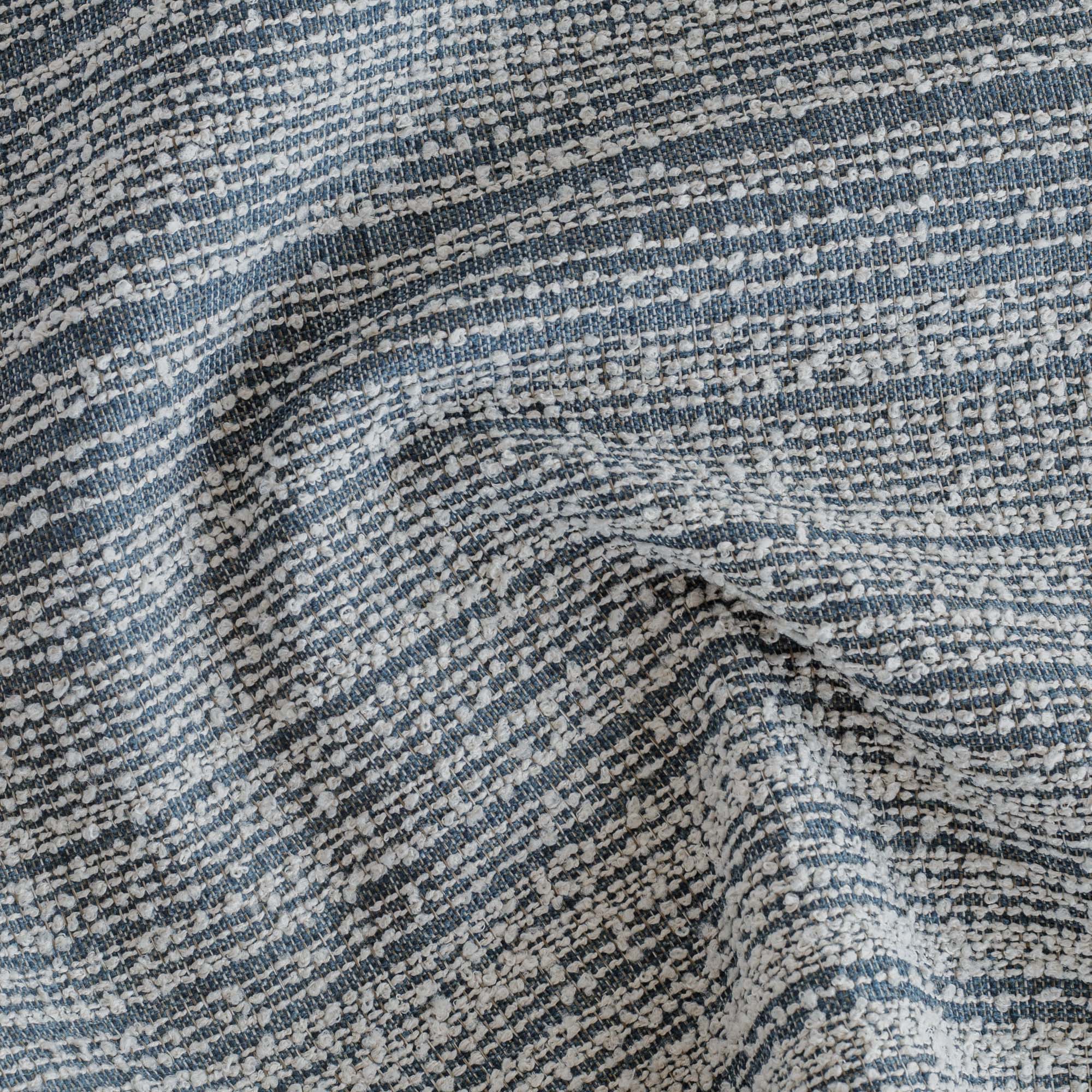 a denim blue and white loopy striped home decor fabric