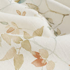 Close up of Tonic Living Laurel Meadow fabric highlighting its watercolour floral pattern.