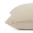 Side zipper detail of Tonic Living Leo Stripe 20x20 throw pillow in wheat and natural stripe.