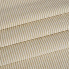 Tonic Living Leo Stripe Wheat fabric for drapery, curtains, and Roman shades featuring a neutral vertical stripe.