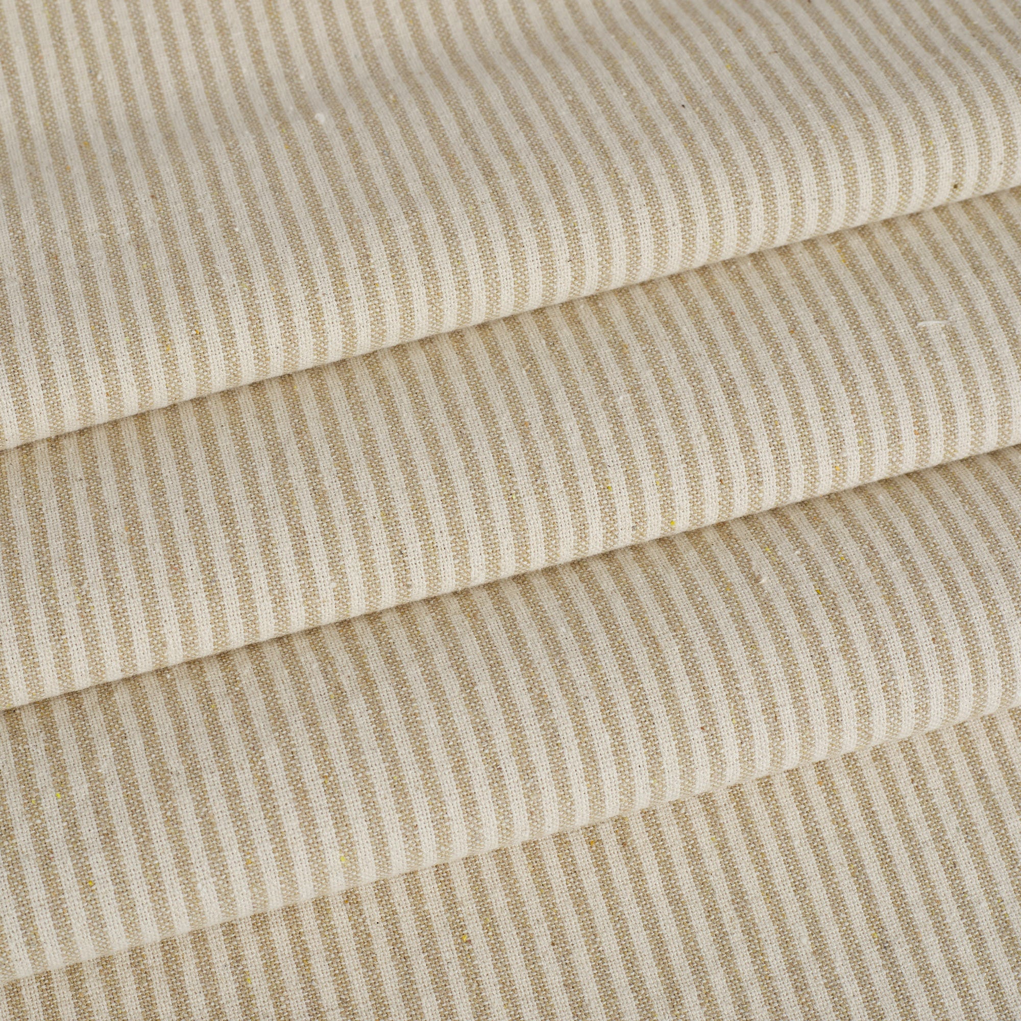 Tonic Living Leo Stripe Wheat fabric for drapery, curtains, and Roman shades featuring a neutral vertical stripe.