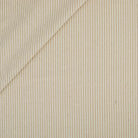 Tonic Living Leo Stripe Wheat 100% cotton fabric with a beige and natural striped pattern.