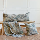 Tonic Living Manor Tapestry Sage collection styled together: 16x42 bolster pillow, 20x20 pillow, and matching fabric.