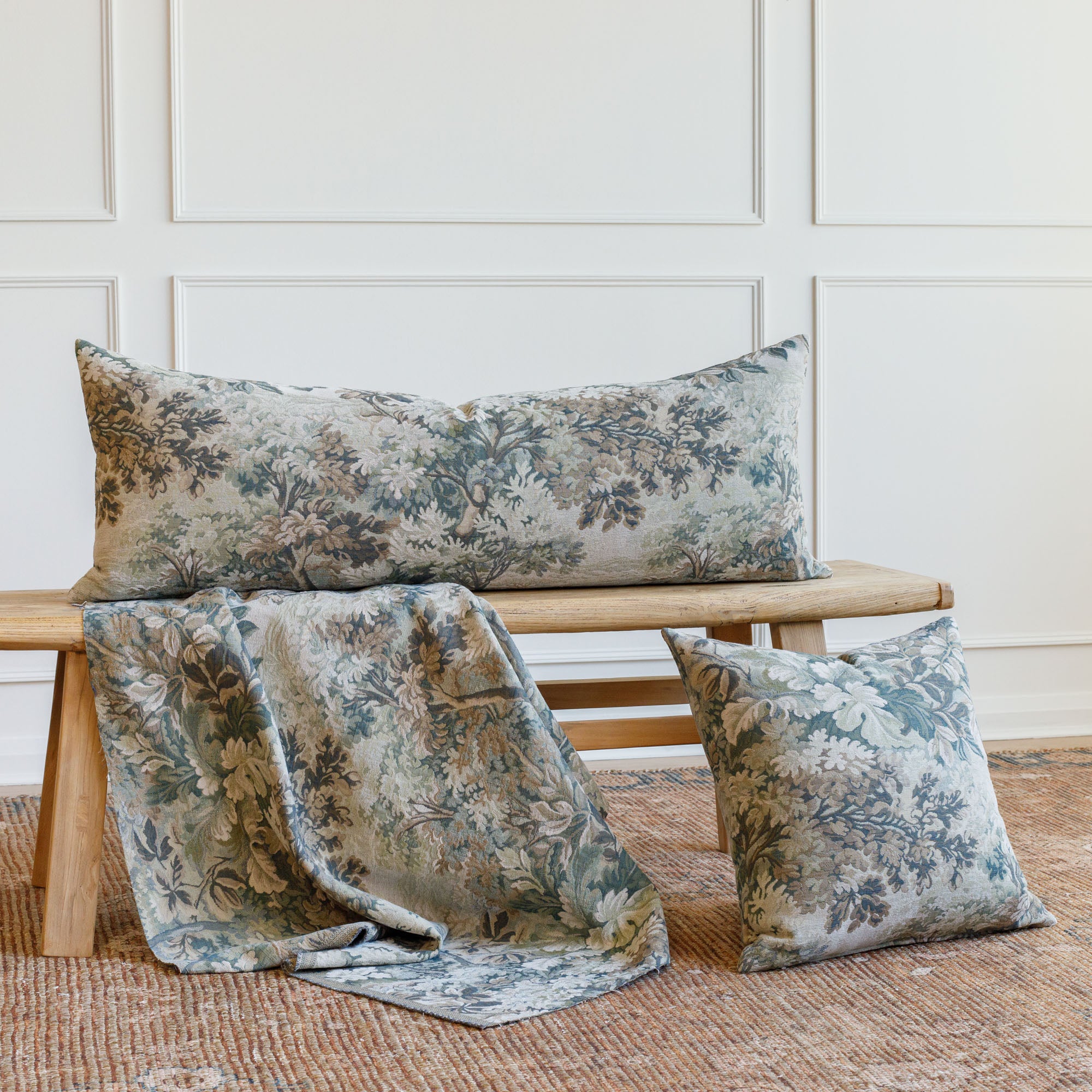 Tonic Living Manor Tapestry Sage collection styled together: 16x42 bolster pillow, 20x20 pillow, and matching fabric.