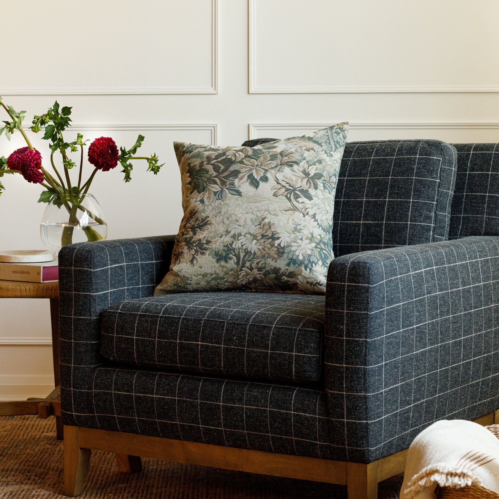 Manor Tapestry 20x20 accent pillow in sage green styled on a chair, featuring vintage botanical tapestry look.