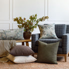 Living room styling with Tonic Living pillows: Manor Tapestry Sage, Manor Moss bolster, Bedford Coffee, Bedford Moss, and Dash Ochre.