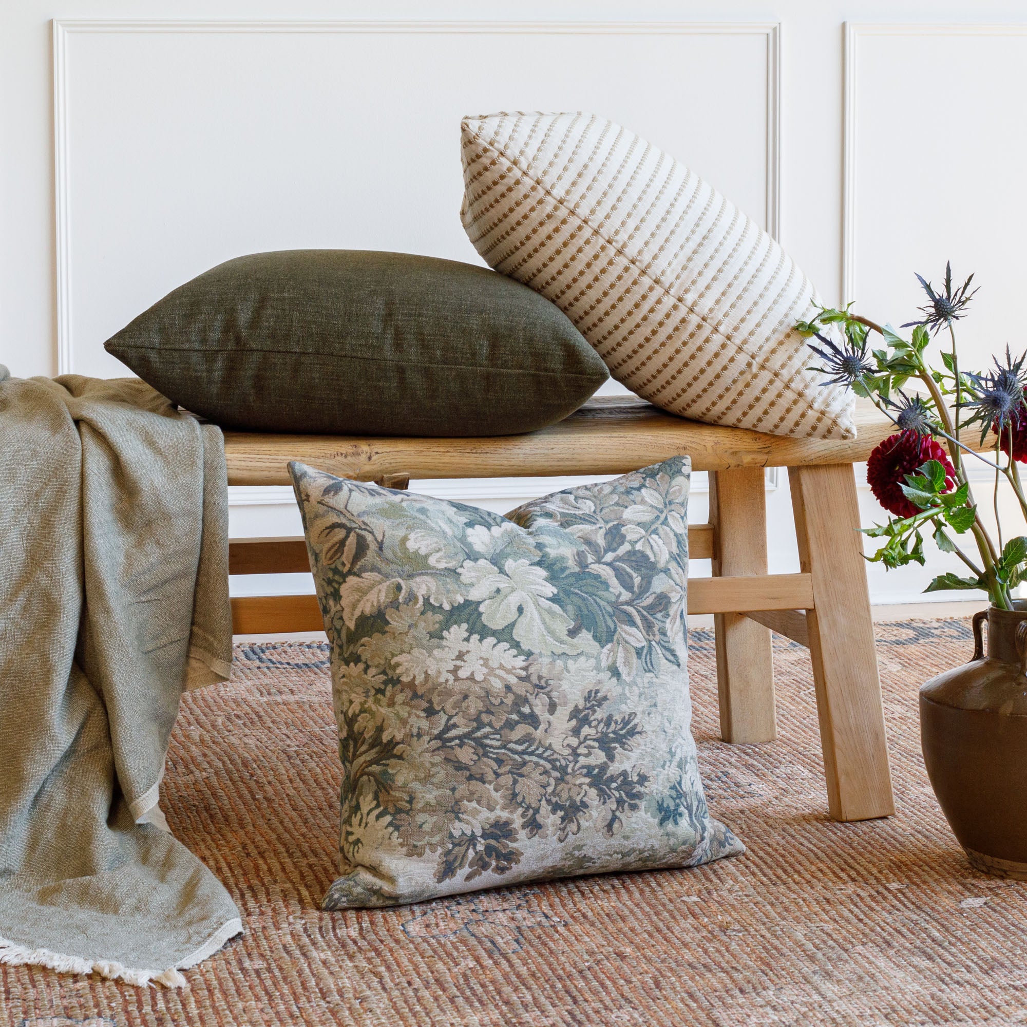 Styled Tonic Living pillows: Bedford Moss, Manor Tapestry Sage, and Dash Ochre decorative cushions.