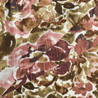 Tonic Living Marbella Fabric in Rose, an abstract floral fabric with burgundy and dusty pink blooms.